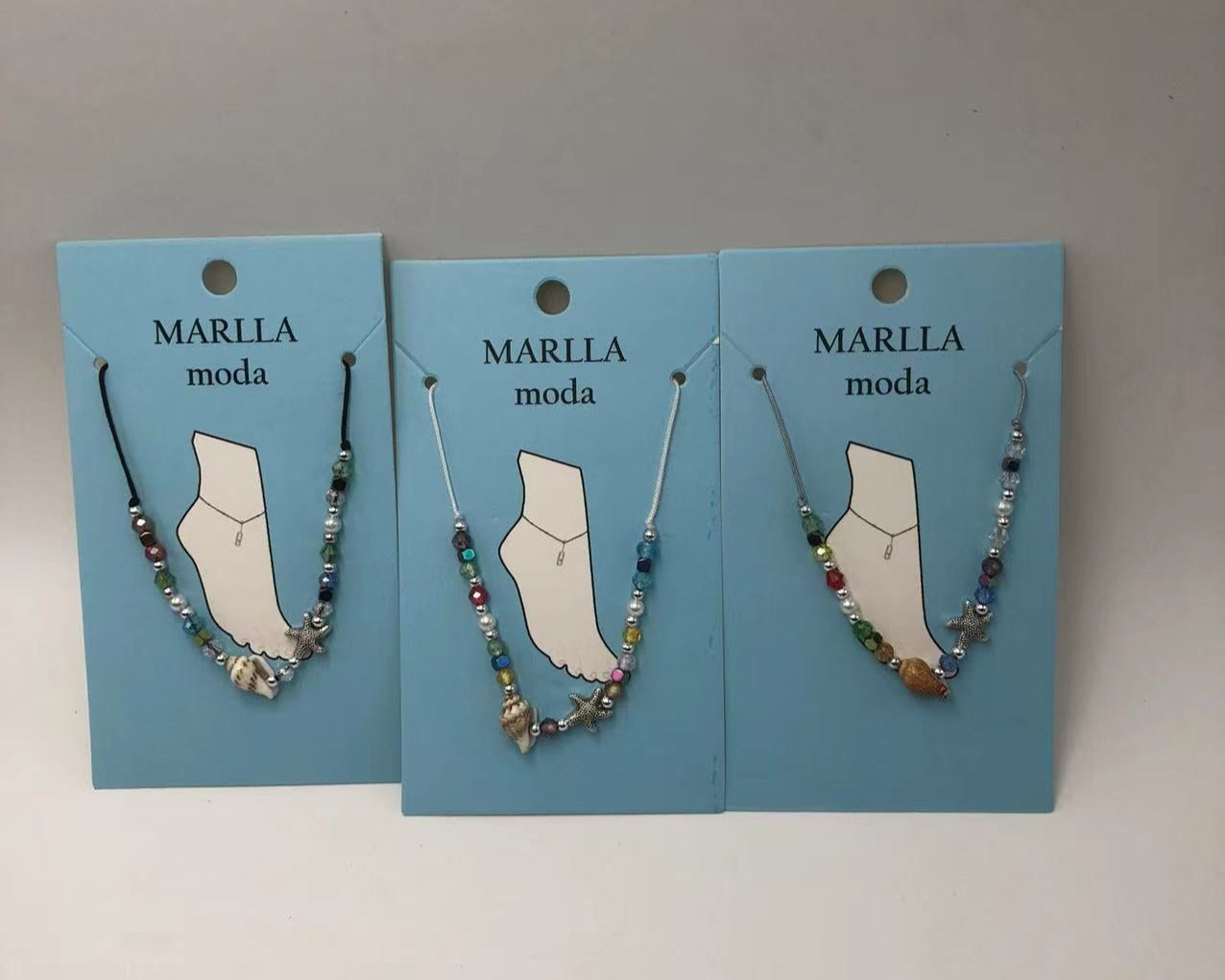 Nanožnice s različitim perlama i školjkicom